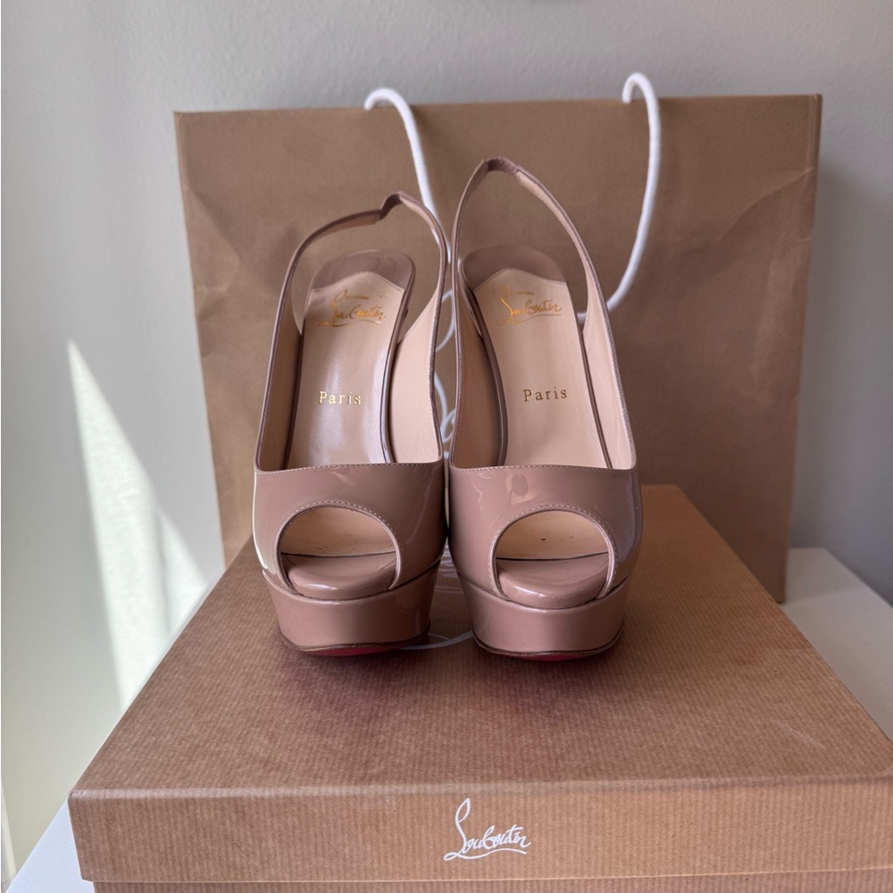 Christian Louboutin Tan Red Heels